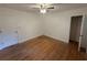 Bedroom features light colored walls and hardwood floors at 2463 Briarmoor Ne Rd, Atlanta, GA 30345