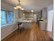 Modern kitchen with stainless steel appliances, quartz countertops, and hardwood floors at 2463 Briarmoor Ne Rd, Atlanta, GA 30345