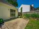 The backyard patio with a sliding glass door and a view of the yard at 648 Bellingham Dr, Sugar Hill, GA 30518