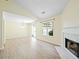 Bright dining area with sliding glass door and views of the living space at 648 Bellingham Dr, Sugar Hill, GA 30518