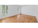 Bright bedroom with hardwood floors and plantation shutters at 870 Richmond Hill Dr, Marietta, GA 30068