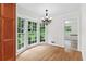 Bright dining room with hardwood floors and large bay window at 870 Richmond Hill Dr, Marietta, GA 30068