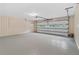 Spacious two car garage with bright lighting and painted floor at 870 Richmond Hill Dr, Marietta, GA 30068