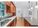 Traditional kitchen with stainless steel appliances, wood cabinets, and bright window at 870 Richmond Hill Dr, Marietta, GA 30068