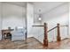 Hallway with hardwood floors, wooden railing, and seating area at 1110 Parkview Se Pl, Smyrna, GA 30080