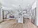 Open kitchen and dining area with stainless steel appliances and ample counter space at 1110 Parkview Se Pl, Smyrna, GA 30080