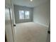 A bedroom featuring natural light from the windows; ready for carpet and paint at 149 Silvercrest Dr, Acworth, GA 30101