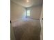Cozy bedroom featuring neutral carpet, a window, and ample space at 149 Silvercrest Dr, Acworth, GA 30101