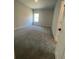 Inviting bedroom with plush carpeting and natural light, creating a serene and comfortable retreat at 149 Silvercrest Dr, Acworth, GA 30101