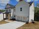 Side view of a two-story home with a two-car garage and well-maintained landscaping at 149 Silvercrest Dr, Acworth, GA 30101