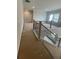 View from the second floor hallway with an iron and wood railing at 149 Silvercrest Dr, Acworth, GA 30101