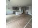 Spacious kitchen island with a sink, modern appliances, and sleek countertops at 149 Silvercrest Dr, Acworth, GA 30101