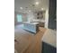 Kitchen featuring an island with stone countertops and modern pendant lights at 149 Silvercrest Dr, Acworth, GA 30101