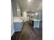 Spacious kitchen with an island, ample cabinetry, and modern pendant lighting at 149 Silvercrest Dr, Acworth, GA 30101