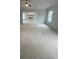 Spacious living room showcasing an open floorplan with a fireplace and ample natural light at 149 Silvercrest Dr, Acworth, GA 30101