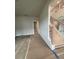 Spacious living room featuring a staircase with wood and iron railing at 149 Silvercrest Dr, Acworth, GA 30101