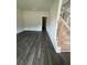 Open-concept living room featuring hardwood floors and natural light at 149 Silvercrest Dr, Acworth, GA 30101