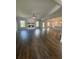 Bright and airy living room with a fireplace, large windows, and seamless access to the kitchen at 149 Silvercrest Dr, Acworth, GA 30101