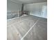 Loft area featuring wood and iron railing, natural light and open space at 149 Silvercrest Dr, Acworth, GA 30101