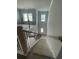 A staircase with natural light from the windows overhead, ready for its new owners at 149 Silvercrest Dr, Acworth, GA 30101