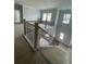A home staircase with wood and iron railing; ready for its new owners at 149 Silvercrest Dr, Acworth, GA 30101
