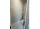 Clean and simple toilet room featuring a modern toilet and stylish marble-look tile flooring at 149 Silvercrest Dr, Acworth, GA 30101
