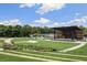 Large outdoor amphitheater with a stage and tiered lawn seating, perfect for concerts and performances at 214 Bluestone Dr, Woodstock, GA 30188