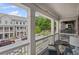 Relaxing balcony featuring outdoor seating and views of the neighborhood at 214 Bluestone Dr, Woodstock, GA 30188