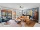 Elegant living room showcases a grand piano, stylish furnishings, and a relaxing atmosphere at 214 Bluestone Dr, Woodstock, GA 30188