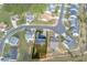 Property aerial showing landscaping, ample yard and neighborhood cul-de-sac at 3984 Potomac Walk Ct, Loganville, GA 30052
