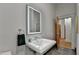 Bathroom featuring modern sink, sleek mirror and decorative black hand towel at 799 Monroe Ne Dr, Atlanta, GA 30308