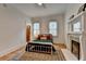 Charming bedroom with hardwood floors, vintage fireplace, and bright natural light at 799 Monroe Ne Dr, Atlanta, GA 30308