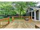 Spacious wooden deck overlooking a beautifully landscaped yard at 799 Monroe Ne Dr, Atlanta, GA 30308