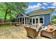 Charming outdoor deck connected to house, furnished with cozy seating area at 799 Monroe Ne Dr, Atlanta, GA 30308
