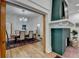 Bright dining room featuring a modern chandelier, with a view into the living room at 799 Monroe Ne Dr, Atlanta, GA 30308