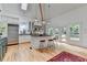 Bright kitchen featuring an island with seating, stainless steel appliances, and access to deck at 799 Monroe Ne Dr, Atlanta, GA 30308