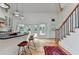 Bright kitchen with island seating, pendant lights, and access to the outdoor space at 799 Monroe Ne Dr, Atlanta, GA 30308