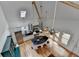 Aerial view of the spacious kitchen with island seating, skylight, and stainless steel appliances at 799 Monroe Ne Dr, Atlanta, GA 30308
