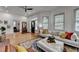 Spacious living room with hardwood floors and view into other rooms at 799 Monroe Ne Dr, Atlanta, GA 30308