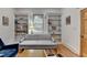 Comfortable living room with natural light and charming built-in bookshelves surrounding the window at 799 Monroe Ne Dr, Atlanta, GA 30308