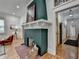 Charming living room with a unique fireplace and hardwood floors at 799 Monroe Ne Dr, Atlanta, GA 30308