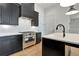Modern kitchen with stainless steel appliances and custom cabinetry at 150 Rolison Way, Fayetteville, GA 30214