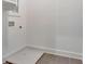 A utility sink sits against the wall in the laundry room at 150 Rolison Way, Fayetteville, GA 30214