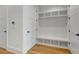 Well-organized mudroom with built-in bench, cubbies, and storage cabinets for an efficient entryway at 150 Rolison Way, Fayetteville, GA 30214