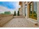 View of a large brick patio, next to the house, with a privacy wall at 150 Rolison Way, Fayetteville, GA 30214