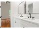 Contemporary bathroom with double vanity, undermount sinks, and modern fixtures at 1525 Tapestry Rdg, Lawrenceville, GA 30045