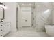 Beautiful bathroom featuring a standalone tub and glass-enclosed shower at 1525 Tapestry Rdg, Lawrenceville, GA 30045