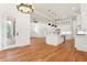 Bright dining area with hardwood floors and modern lighting at 1525 Tapestry Rdg, Lawrenceville, GA 30045