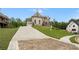 Stunning home with a long driveway and well-maintained landscaping at 1525 Tapestry Rdg, Lawrenceville, GA 30045