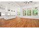 Open-concept kitchen and living area with plenty of natural light at 1525 Tapestry Rdg, Lawrenceville, GA 30045